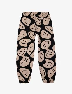 Molo Adan Smiley-print Organic Cotton-jersey Jogging Bottoms 4-10 Years 5 Molo Adan Smiley-print Organic Cotton-jersey Jogging Bottoms 4-10 Years -Kid Couture R04184157 SMILEONBLACK ALT02